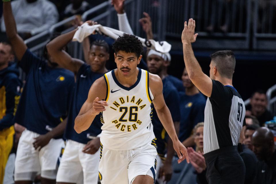 Oct 16, 2023; Indianapolis, Indiana, USA; Indiana Pacers guard Ben Sheppard (26) celebrates a made three point basket in the second quarter against the Atlanta Hawks at Gainbridge Fieldhouse. Mandatory Credit: Trevor Ruszkowski-USA TODAY Sports