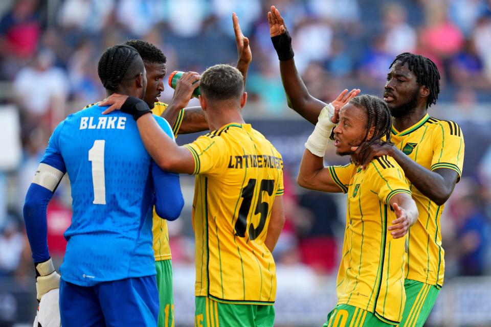 Jamaica goalkeeper Andre Blake (1), Jamaica midfielder Joel Latibeaudiere (15), Jamaica midfielder Bobby Decordova-Reid (10) and Jamaica forward Shamar Nicholson (11) celebrate the win at the conclusion of a Gold Cup quarterfinal match between Guatemala and Jamaica, Sunday, July 9, 2023, at TQL Stadium in Cincinnati.