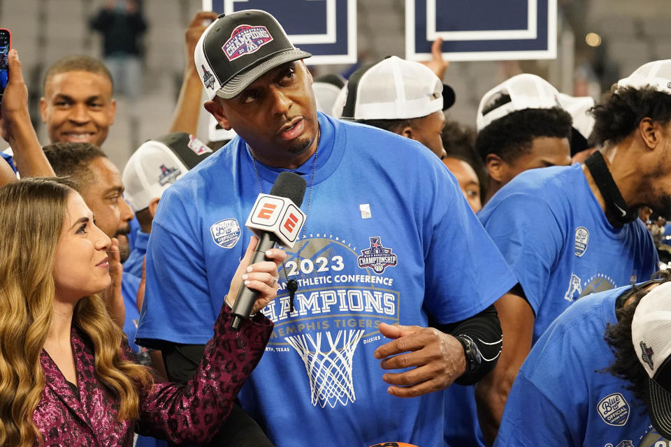 Memphis head coach Penny Hardaway, center, speaks after after winning the finals against Houston in the American Athletic Conference Tournament, Sunday, March 12, 2023, in Fort Worth, Texas. (AP Photo/LM Otero)