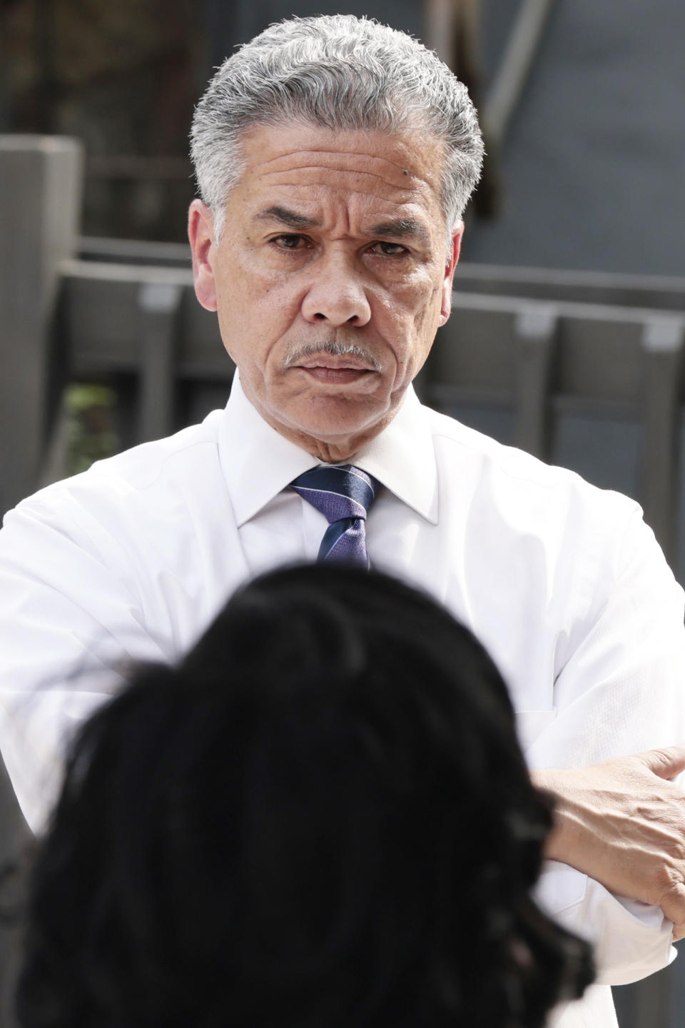 Philadelphia District Attorney candidate Carlos Vega listens during a meet and greet event at Read Ready Daycare and Early Learning Academy in Philadelphia on Sunday, May 16, 2021. Vega is challenging incumbent District Attorney Larry Krasner and both candidates are making a final push for votes before the election on May 18. (Elizabeth Robertson/The Philadelphia Inquirer via AP)