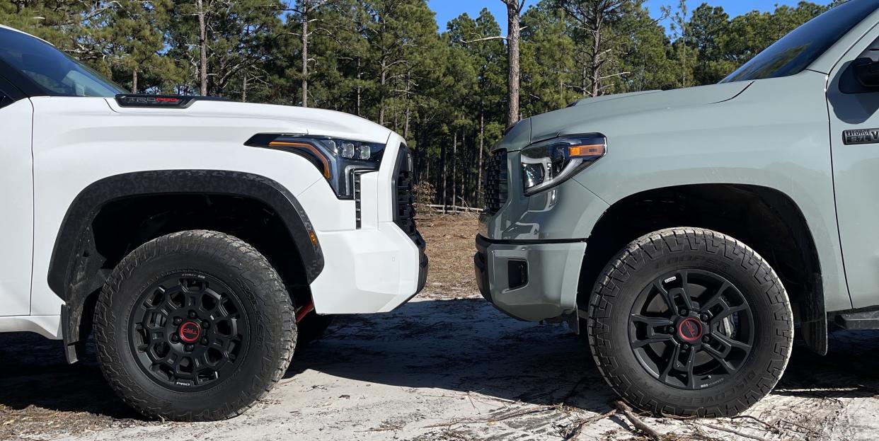 2022 white toyota tundra nose facing 2021 lunar rock toyota tundra