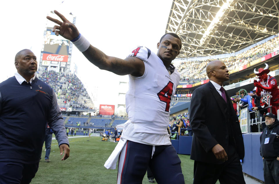 Houston Texans quarterback Deshaun Watson waves to fans as he leaves the field following an NFL football game against the Seattle Seahawks on Sunday. (AP)