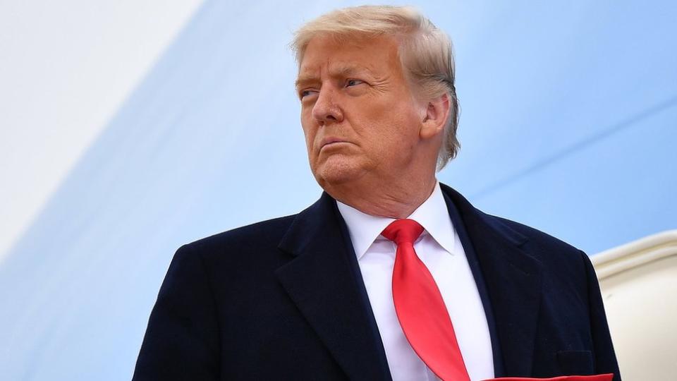 US President Donald Trump boards Air Force One before departing Harlingen, Texas on 12 January 2021