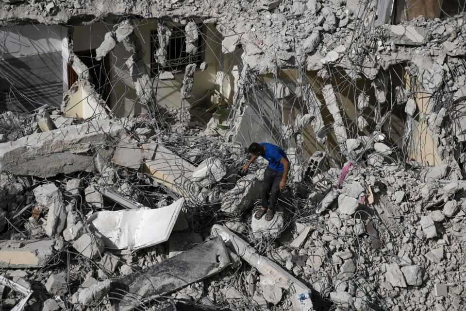 A Palestinian man inspects the damage to a building after Israeli forces raided the West Bank city of Jenin, Thursday, May 23, 2024. The Israeli military said Thursday it has completed a two-day operation in the occupied West Bank that killed and wounded multiple Palestinians, according to the Palestinian Health Ministry. The Palestinian Islamic Jihad militant group said its fighters battled the Israeli forces. (AP Photo/Majdi Mohammed)