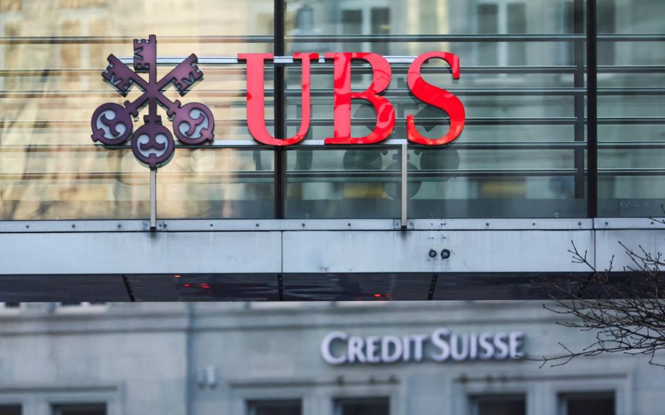  UBS and Credit Suisse - REUTERS/Denis Balibouse