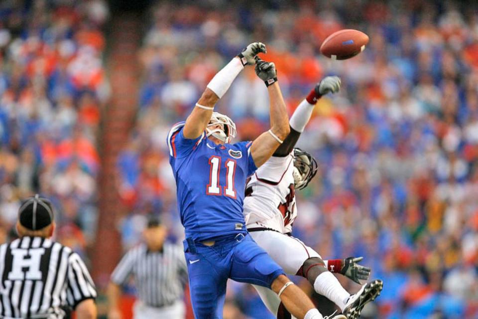 South Carolina cornerback C.C. Whitlock No. 12 knocks away a pass intended for Florida wide receiver Riley Cooper No. 11 during the second quarter.