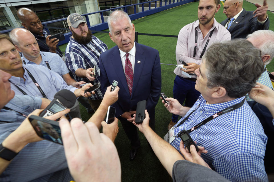 Big 12 commissioner Bob Bowlsby speaks to reporters during NCAA college football Big 12 media days Wednesday, July 14, 2021, in Arlington, Texas. (AP Photo/LM Otero)