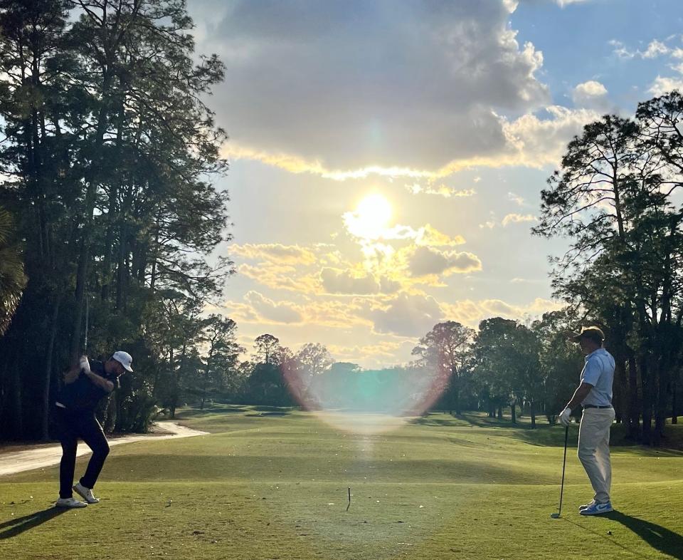 Kevin McDonald is poised over his tee shot at the par-4 14th hole of the San Jose Country Club in Monday during the first round of the 32nd Underwood Cup Matches. Watching is foursomes opponent Gerry James.