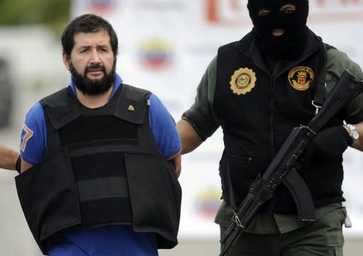 El capo del narcotráfico Daniel "El Loco" Barrera arribó la tarde de este miércoles a Bogotá deportado desde Venezuela junto con otras cinco personas, informó la Policía. (AFP | leo ramirez)