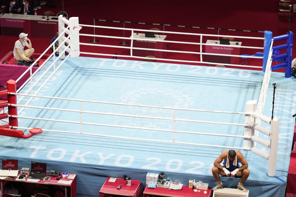 Eliad Mourad, of France refuses to leave the ring after losing a men's super heavyweight over 91-kg boxing match against Britain's Frazer Clarke at the 2020 Summer Olympics, Sunday, Aug. 1, 2021, in Tokyo, Japan. (AP Photo/Frank Franklin II)