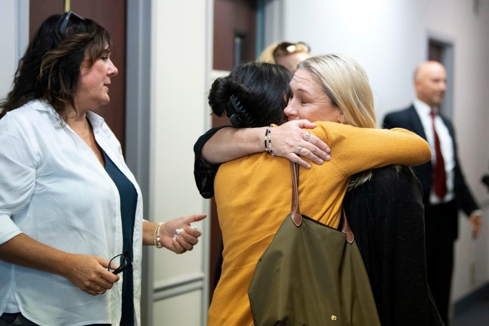 Guests greet Angie Hibbs, the victim’s daughter, as they leave the courtroom during a break from the preliminary hearing for Robert Atkins who is accused in the 1991 murder and arson of Joy Hibbs, 35, of Bristol Township on Wednesday, Sept. 21, 2022. A cold case that led to an arrest of the long-time suspect in May.