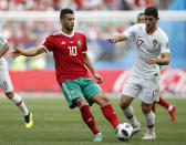 <p>Portugal’s Goncalo Guedes, right, challenges Younes Belhanda </p>