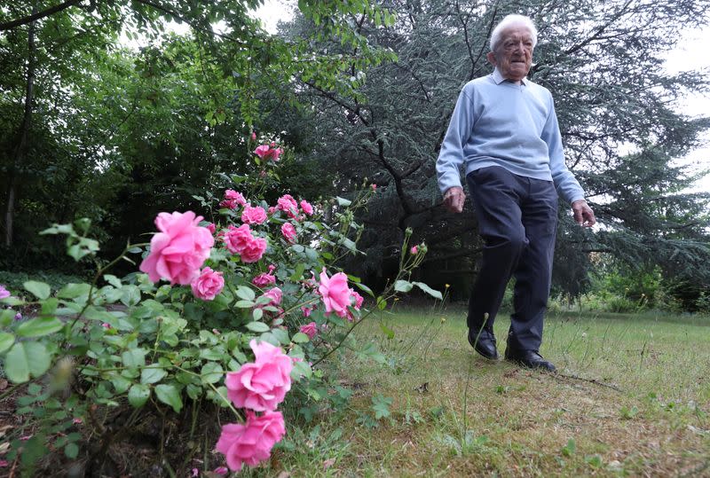 Alfons Leempoels walks the equivalent of a marathon in his garden to raise money to fight against the coronavirus disease (COVID-19) in Rotselaar