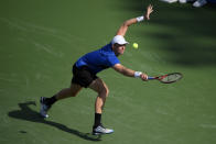 Kevin Anderson, of South Africa, chases the ball during a match in the Citi Open tennis tournament against Jenson Brooksby, Monday, Aug. 2, 2021, in Washington. (AP Photo/Nick Wass)