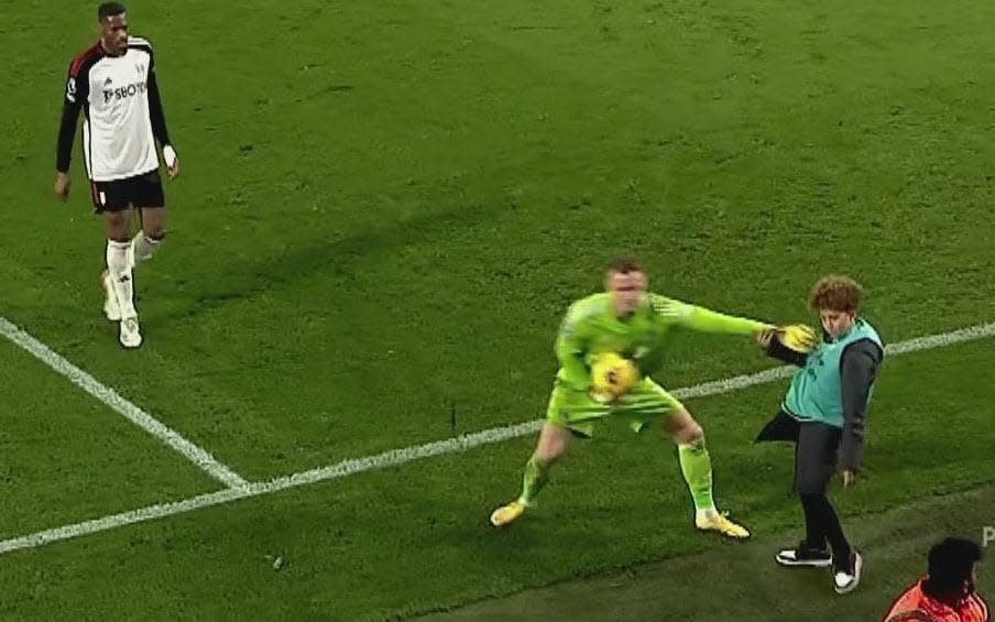 Bernd Leno shoves a ball boy