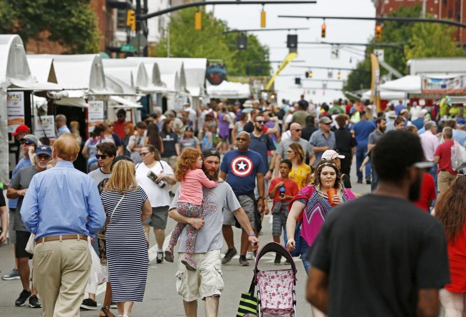 Visitors gather along West Main Street during the 2019 festival, the last time the event has been held since the pandemic began.