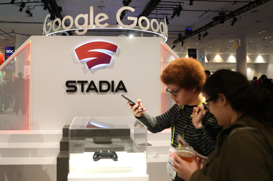 SAN FRANCISCO, CALIFORNIA - MARCH 20: Attendees look at the new Stadia controller on display at the Google booth at the 2019 GDC Game Developers Conference on March 20, 2019 in San Francisco, California. The GDC runs through March 22. (Photo by Justin Sullivan/Getty Images)