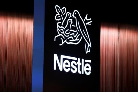 FILE PHOTO: The Nestle logo is seen during the opening of the 151st Annual General Meeting of Nestle in Lausanne, Switzerland April 12, 2018. REUTERS/Pierre Albouy/File Photo