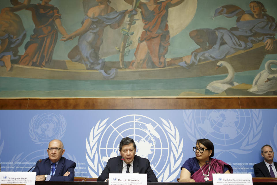 Marzuki Darusman, center, chairperson of the Independent International Fact-finding Mission on Myanmar, sits next to Christopher Sidoti, left, member of the Independent International Fact-finding Mission on Myanmar, and Radhika Coomaraswamy, right, member of the Independent International Fact-finding Mission on Myanmar, as they inform the media on the publication of a final written report on Myanmar, during a press conference, at the European headquarters of the United Nations in Geneva, Switzerland, Monday, Aug. 27, 2018. (Salvatore Di Nolfi/Keystone via AP)