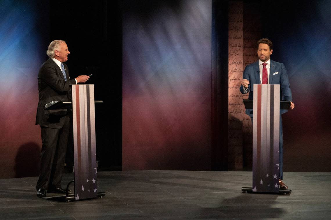 Gov. Henry McMaster and former U.S. Rep. Joe Cunningham participate in a gubernatorial debate in Columbia, S.C., on Wednesday, Oct. 26, 2022. (John A. Carlos II/The Post And Courier via AP)
