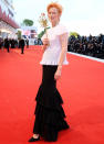 <p>Tilda Swinton poses on the red carpet ahead of the Venice Film Festival opening ceremony on Wednesday in Italy.</p>