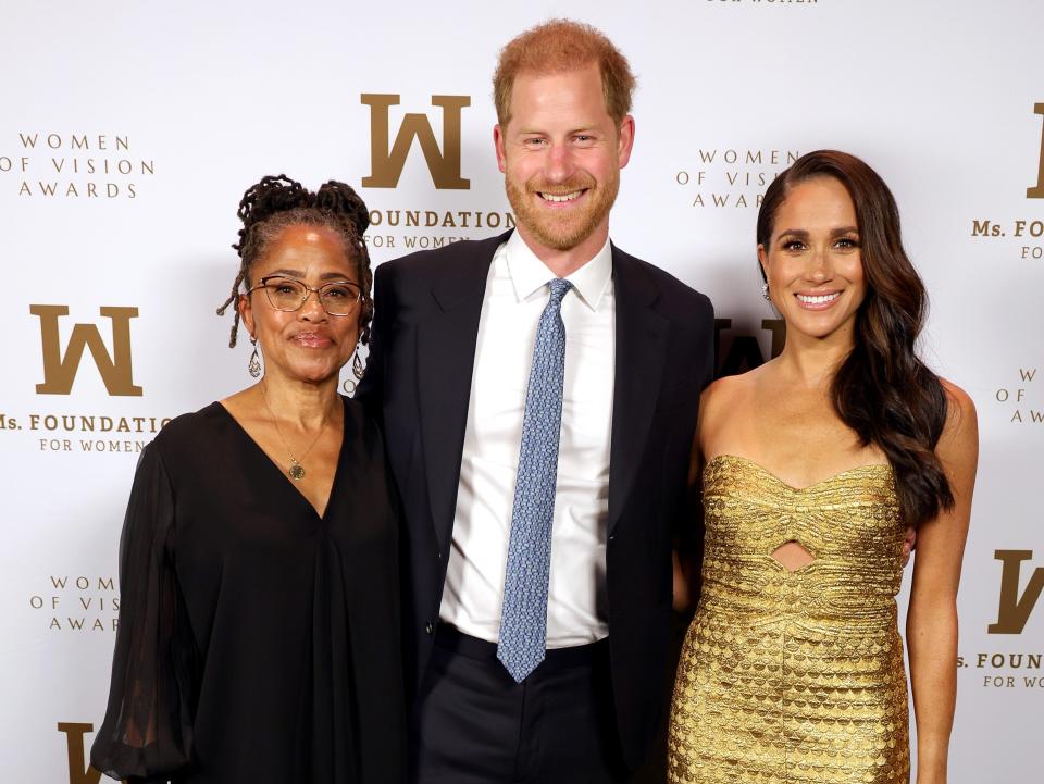 Doria Ragland, Prince Harry, and Meghan Markle.