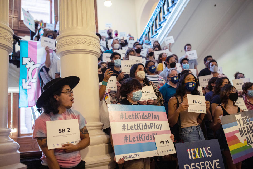 LGBTQ rights supporters gather at the Texas State Capitol on Sept. 20, 2021, to protest Republican-led efforts to ban trans student athletes from playing on the sports team aligned with their gender identity.<span class="copyright">Tamir Kalifa—Getty Images</span>