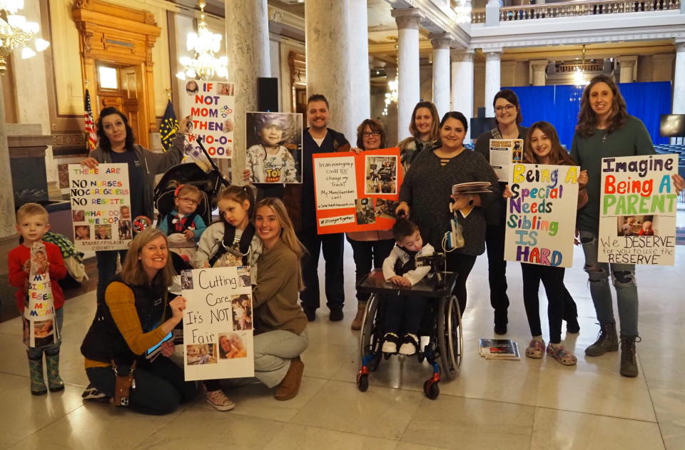  Families rally for a second week at the Indiana Statehouse in January to protest a protest cut to Medicaid services that pay for parents to be attendants for their severely disabled children. (Whitney Downard/Indiana Capital Chronicle)