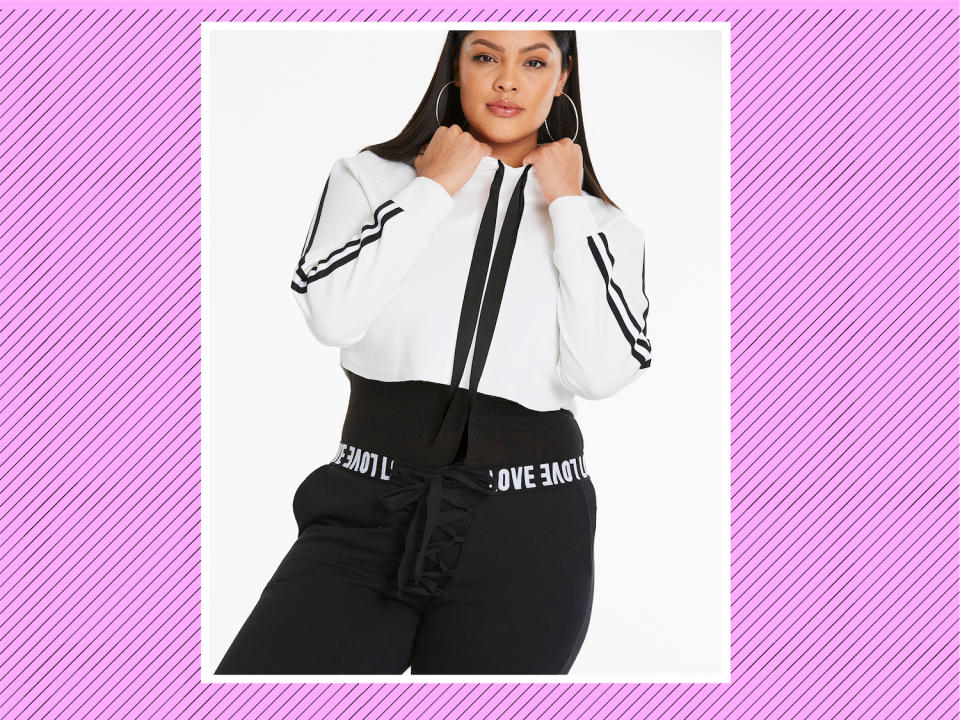 <p><a rel="nofollow noopener" href="https://www.simplybe.com/en-us/products/crop-hoodie-with-sports-trim/p/WZ618#v=color%3AWZ618_WHITE%7C" target="_blank" data-ylk="slk:Crop Hoodie With Sports Trim;elm:context_link;itc:0;sec:content-canvas" class="link ">Crop Hoodie With Sports Trim</a>, $40, and <a rel="nofollow noopener" href="https://www.simplybe.com/en-us/products/lace-up-front-jogger/p/WZ610" target="_blank" data-ylk="slk:Lace Up Front Jogger;elm:context_link;itc:0;sec:content-canvas" class="link ">Lace Up Front Jogger</a>, $46, Simply Be (Photo: Simply Be) </p>