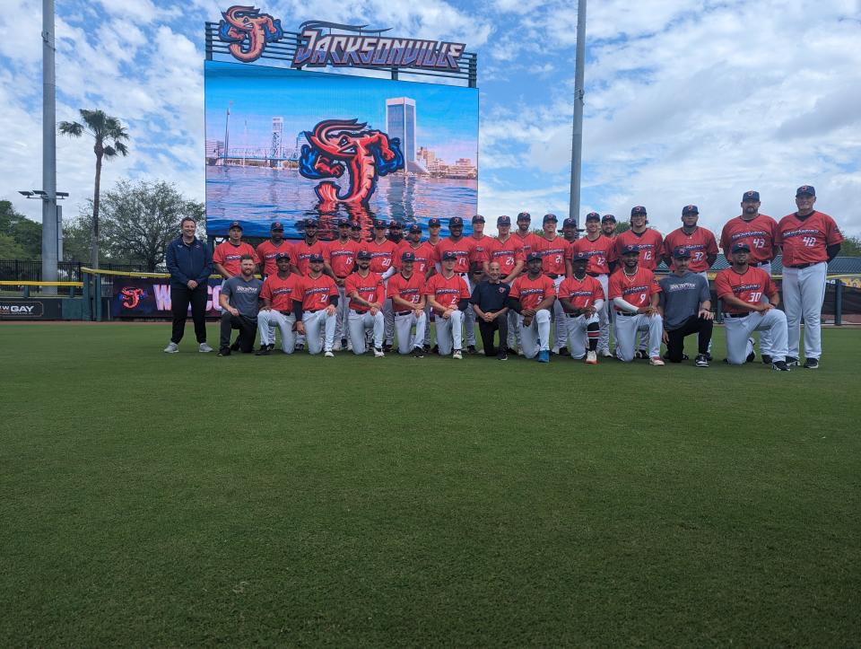 Jacksonville Jumbo Shrimp players and coaches line up for the team photo at 121 Financial Ballpark on March 28, 2024. [Clayton Freeman/Florida Times-Union]