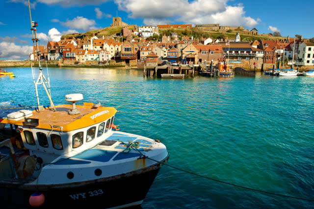 Fishing boat in Whitby harbour. North Yorkshire, England