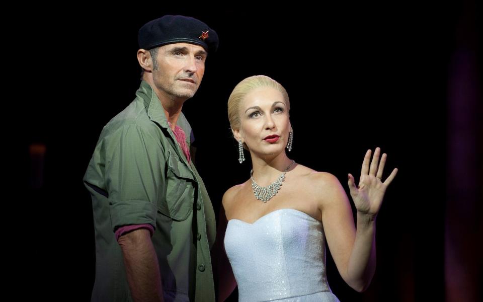 Marti Pellow with Madalena Alberto in Evita - Credit: WILL OLIVER/EPA