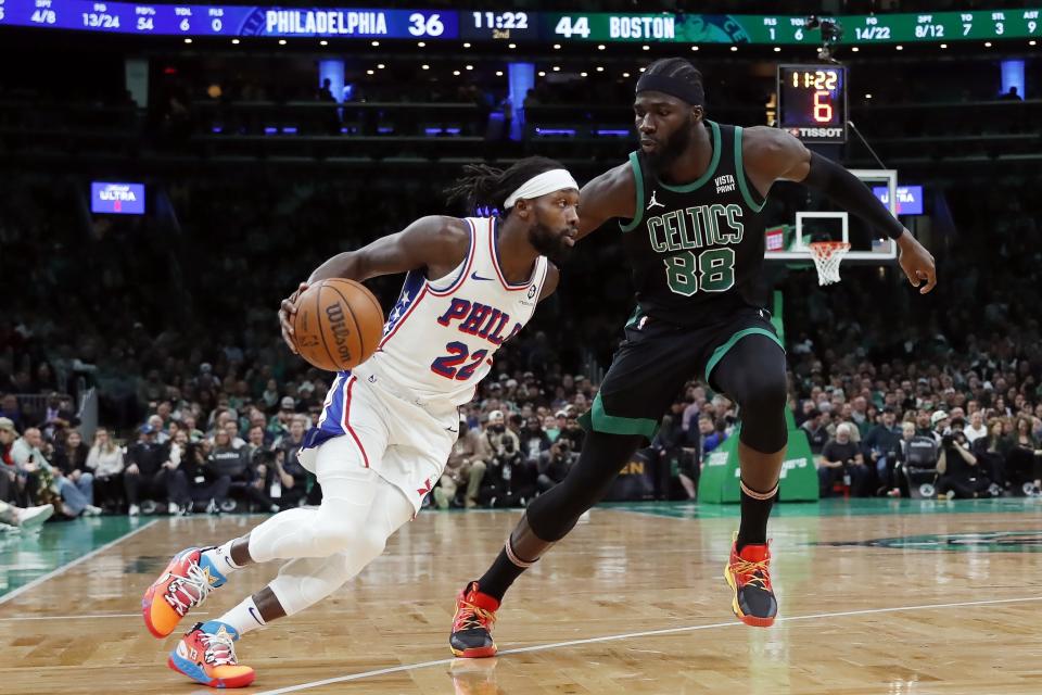 Philadelphia 76ers' Patrick Beverley (22) drives past Boston Celtics' Neemias Queta (88) during the first half of an NBA basketball game Friday, Dec. 1, 2023, in Boston. (AP Photo/Michael Dwyer)