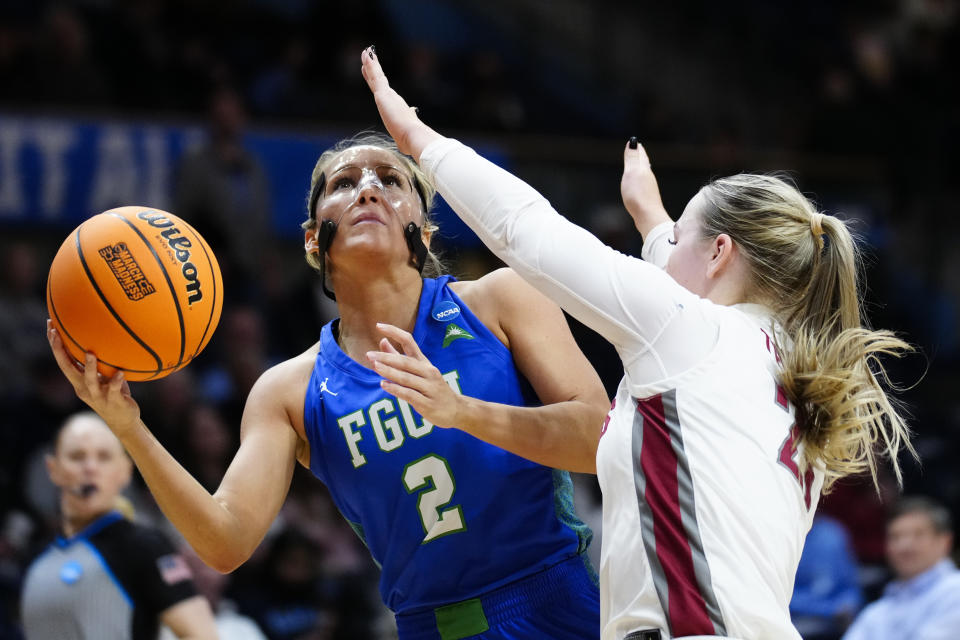 Florida Gulf Coast's Sophia Stiles shoots against Washington State's Johanna Teder during the second half of a first-round college basketball game in the NCAA Tournament, Saturday, March 18, 2023, in Villanova, Pa. (AP Photo/Matt Rourke)