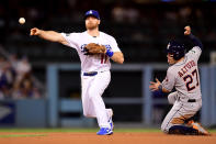 <p>Jose Altuve #27 of the Houston Astros is forced out at second base by Logan Forsythe #11 of the Los Angeles Dodgers during the seventh inning in game one of the 2017 World Series at Dodger Stadium on October 24, 2017 in Los Angeles, California. (Photo by Harry How/Getty Images) </p>