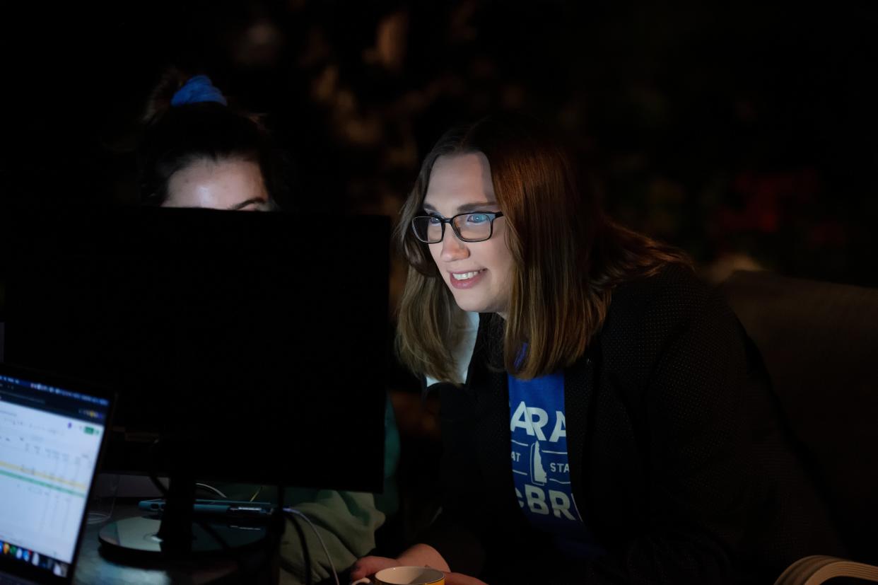 Transgender activist Sarah McBride watches a computer screen at her watch party in Wilmington, Delaware on 15 September 2020 ((AP))