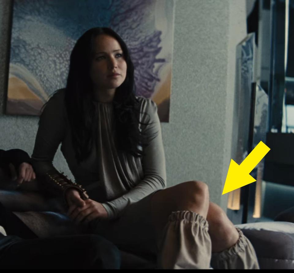 I think about these legwarmers all the time. They make no sense and I wish Katniss was wearing them in every single scene. 