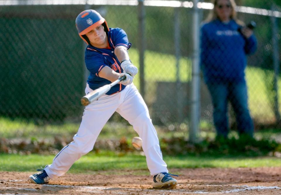 Saint Joseph’s Catholic Academy’s Hayden Lingle gets a hit during the game against Susquenita on Wednesday, April 19, 2023.