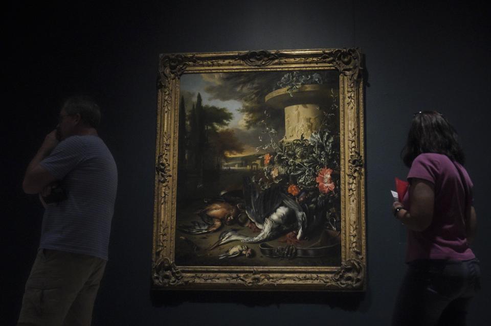 An oil on canvas 1695 painting by Dutch artist Jan Weenix, "Gamepiece with a Dead Heron"—acquired in 1950 by the Metropolitan Museum of Art—is shown on exhibition at the museum Thursday, Sept. 1, 2022, in New York. The painting is among 53 works in the museum's collection, once looted during the Nazi era, but returned to their designated owners before being obtained by the museum through donation or sale. (AP Photo/Bebeto Matthews)