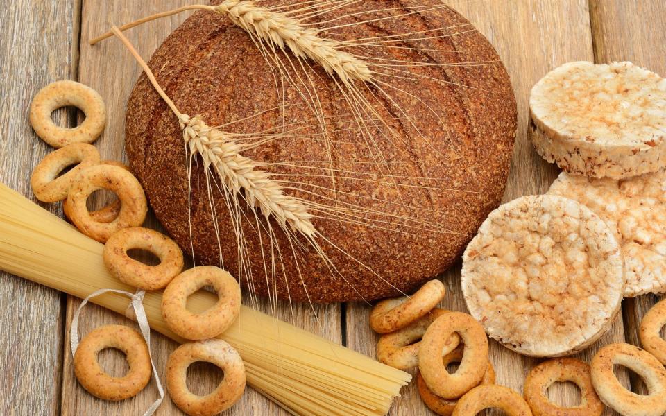 bread, pasta and pastries on a wooden surface - Credit:  alinamd - stock.adobe.com