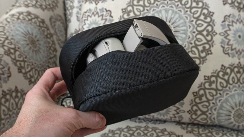 The Beats Studio Pro have a hinge on each side of the headband allowing the headphones to fold up small enough to fit in an included case that’s about as large as a toiletries bag. - Photo: Andrew Liszewski | Gizmodo