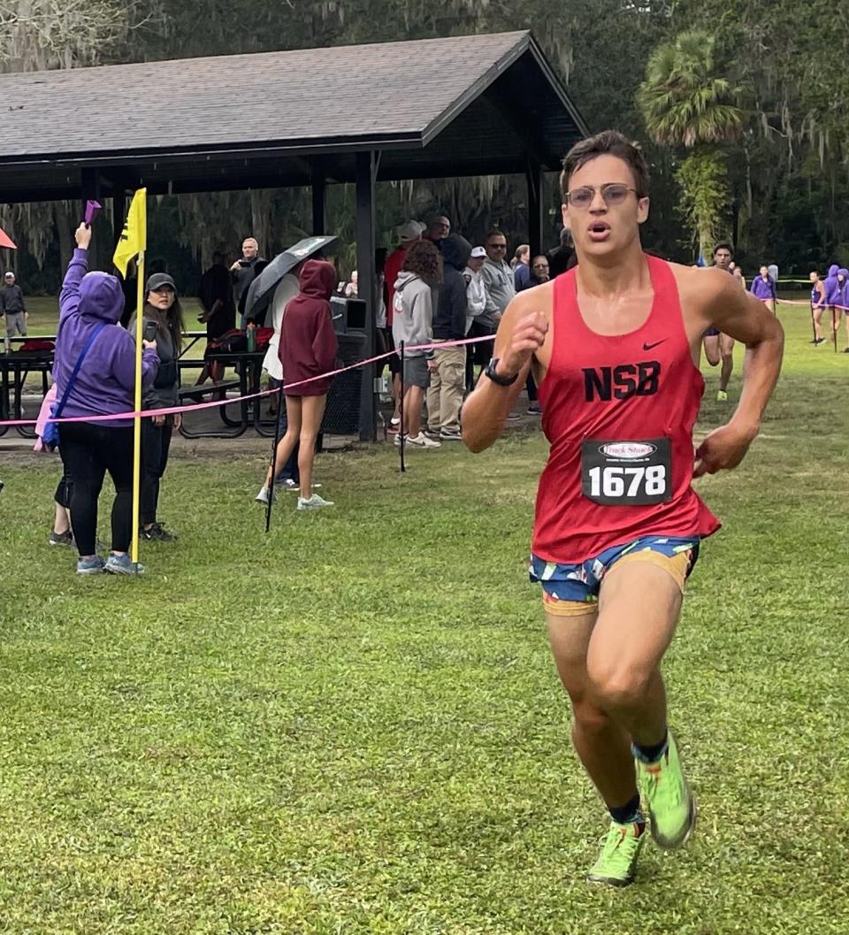 New Smyrna Beach sophomore Sam McDuffie heads toward the finish line at Central Winds Park in Winter Springs, finishing second in the District 3-3A cross country championships.