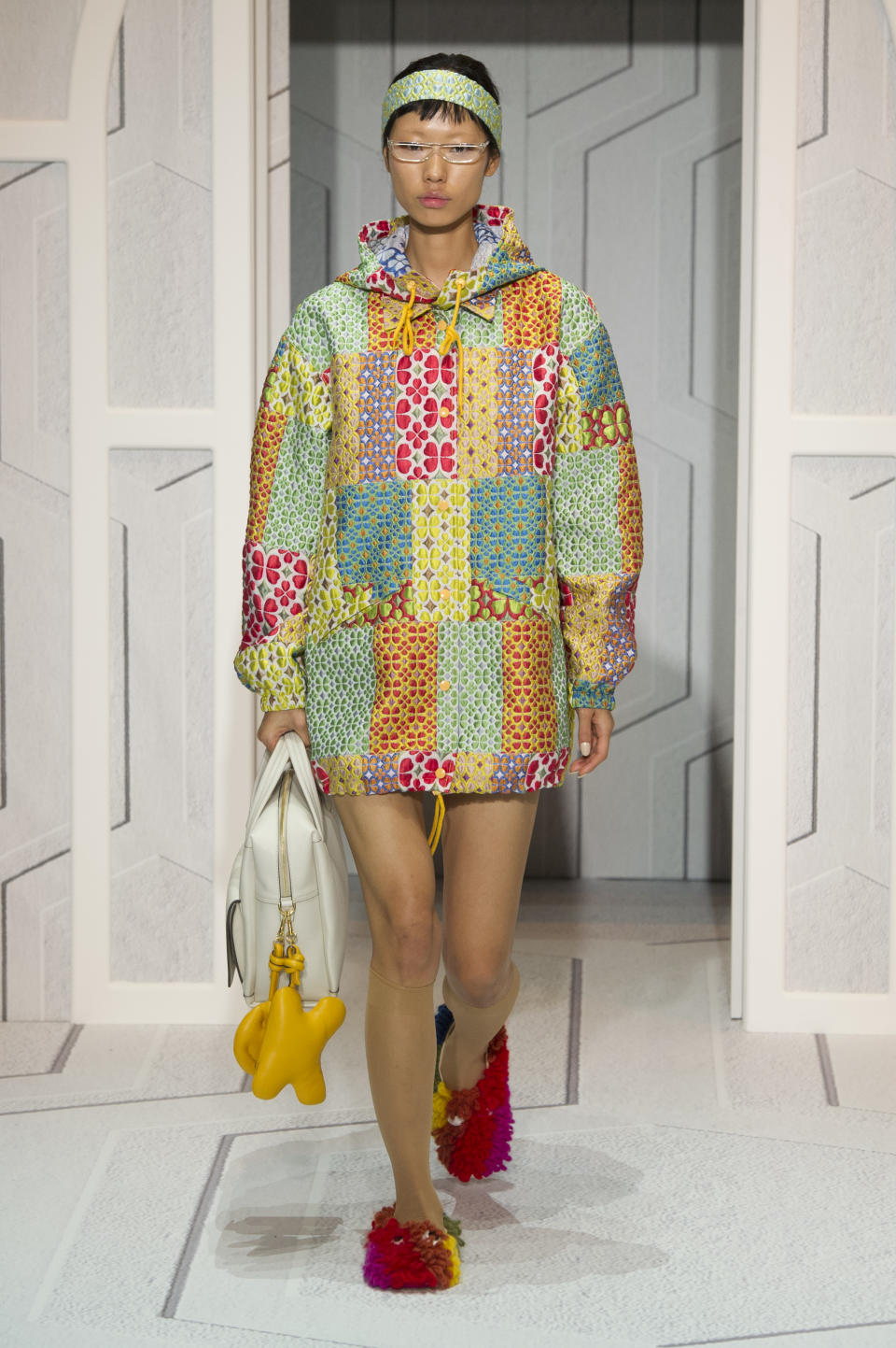 <p><i>Model wears a colorful, patchwork jacket. (Photo: ImaxTree) </i></p>