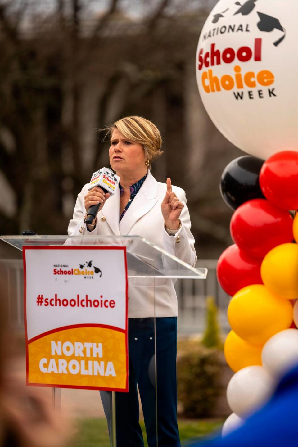 Catherine Truitt, the Republican state superintendent of public instruction, speaks during a rally celebrating National School Choice Week on Halifax Mall in front of the Legislative Building in Raleigh on Jan. 24. North Carolina could see a 60% increase this year in the number of students receiving a private school voucher now that income limits for families have been removed. Travis Long/tlong@newsobserver.com