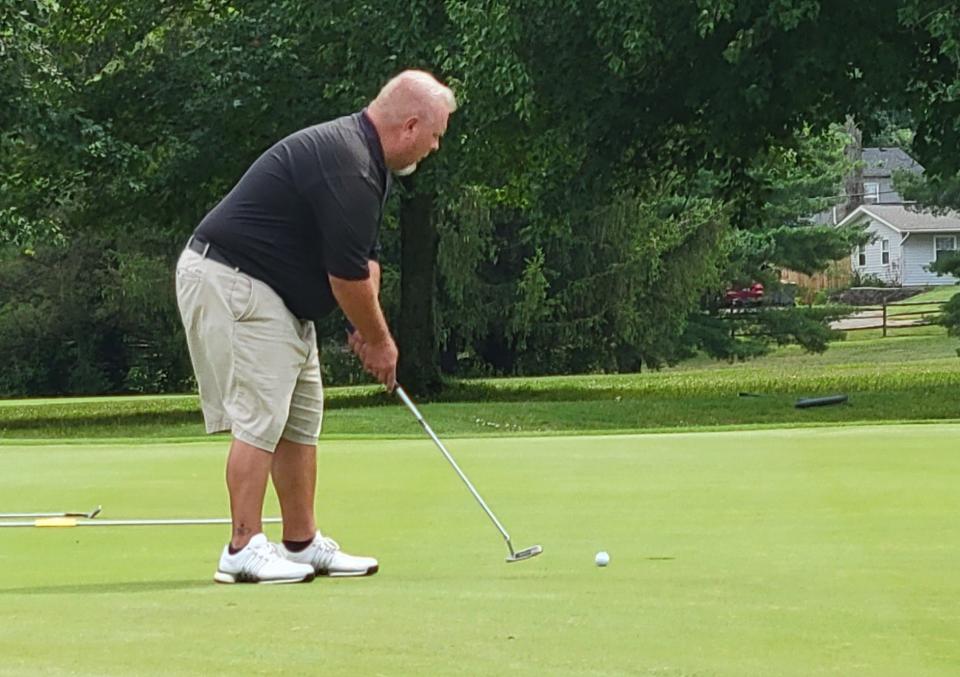 Henry Nethery looks to sink this putt on No. 17 at Cascades Golf Course to send his Senior Championship flight match against Ken Wilson  to the 18th on Saturday, July 8, 2023.