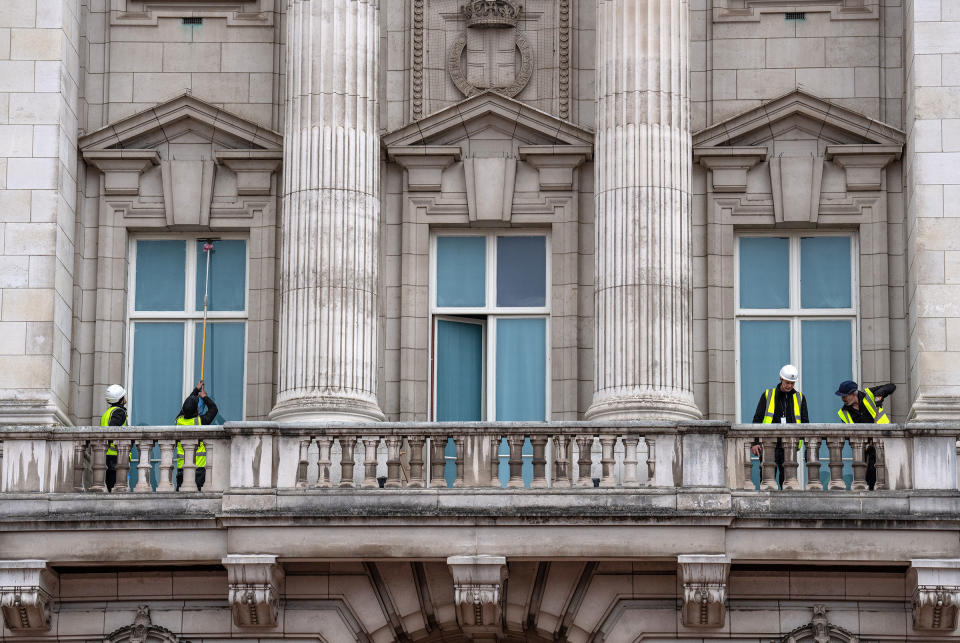 A window is cleaned on the balcony of Buckingham Palace on April 18, 2023.<span class="copyright">Carl Court—Getty Images</span>