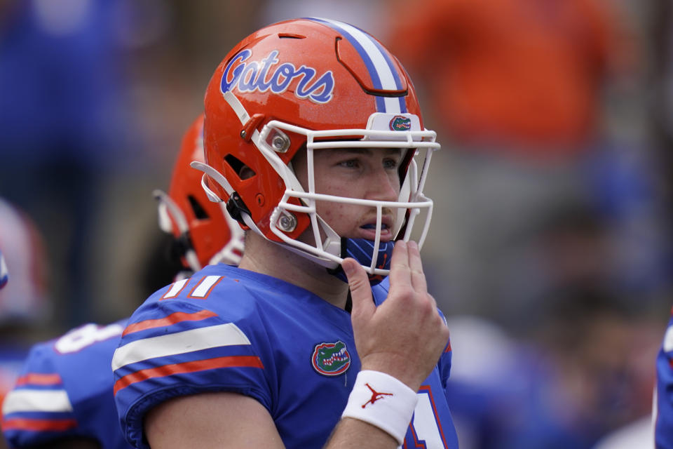 Florida quarterback Kyle Trask gets ready to call a play during the second half of an NCAA college football game against South Carolina, Saturday, Oct. 3, 2020, in Gainesville, Fla. (AP Photo/John Raoux)