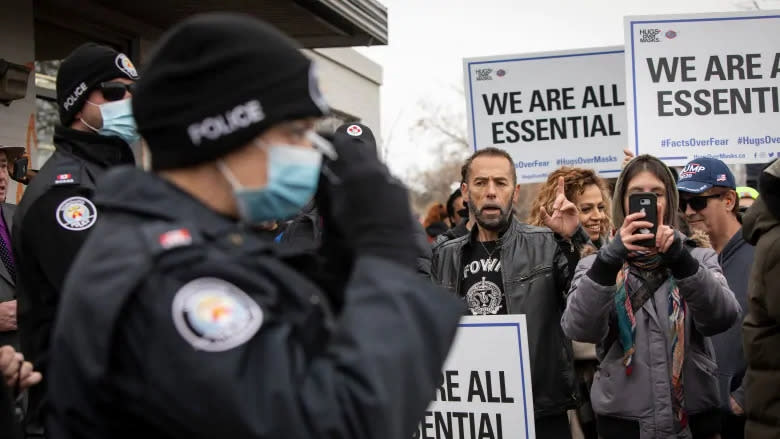 Anti-lockdown demonstrators gather at Adamson Barbecue on Tuesday for the second day despite a shut-down order issued by the province. (Evan Mitsui/CBC)