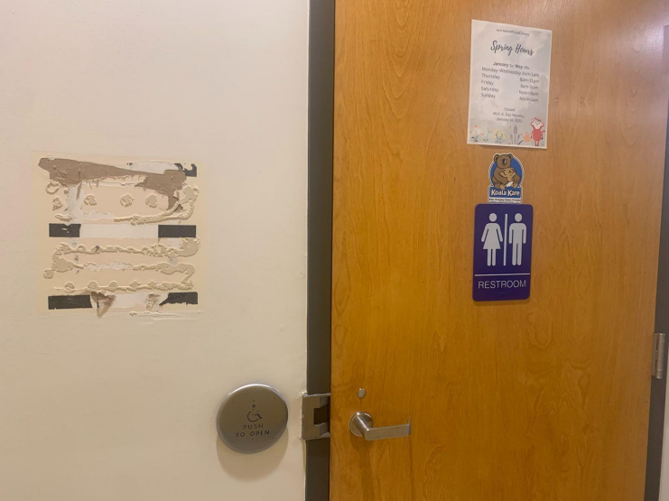 A restroom on New College of Florida's campus with the gender-neutral signage removed, replaced with different signage. New College of Florida was the subject of a civil rights complaint filed to the U.S. Departments of Justice and Education on Aug. 22.