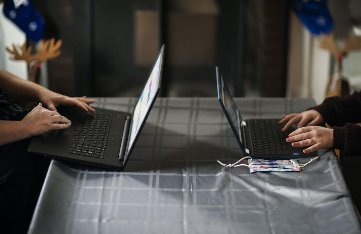 Remote work, which began as a temporary disruption to normal work, has become permanent for many workers since the onset of the pandemic. (AP Photo/David Goldman)